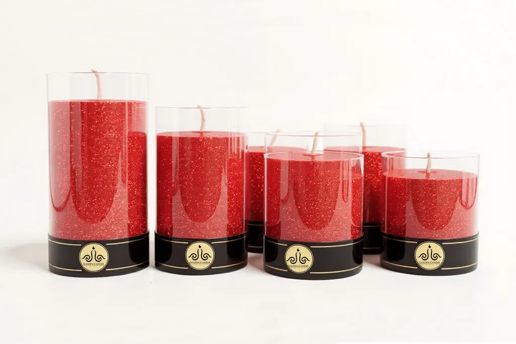 several red pillar candles and golden candle logo in bottom